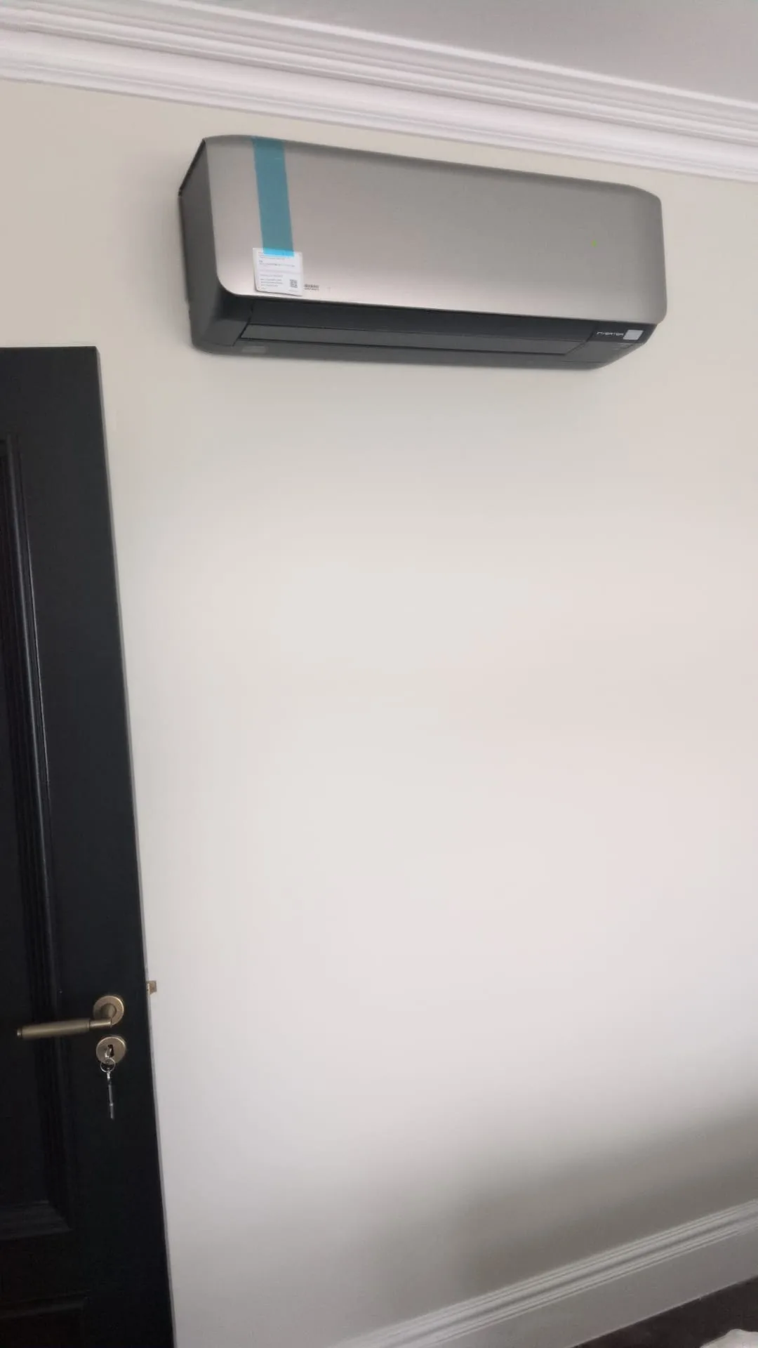 Air conditioning unit fitted in a period Victorian London home with cornice detailing